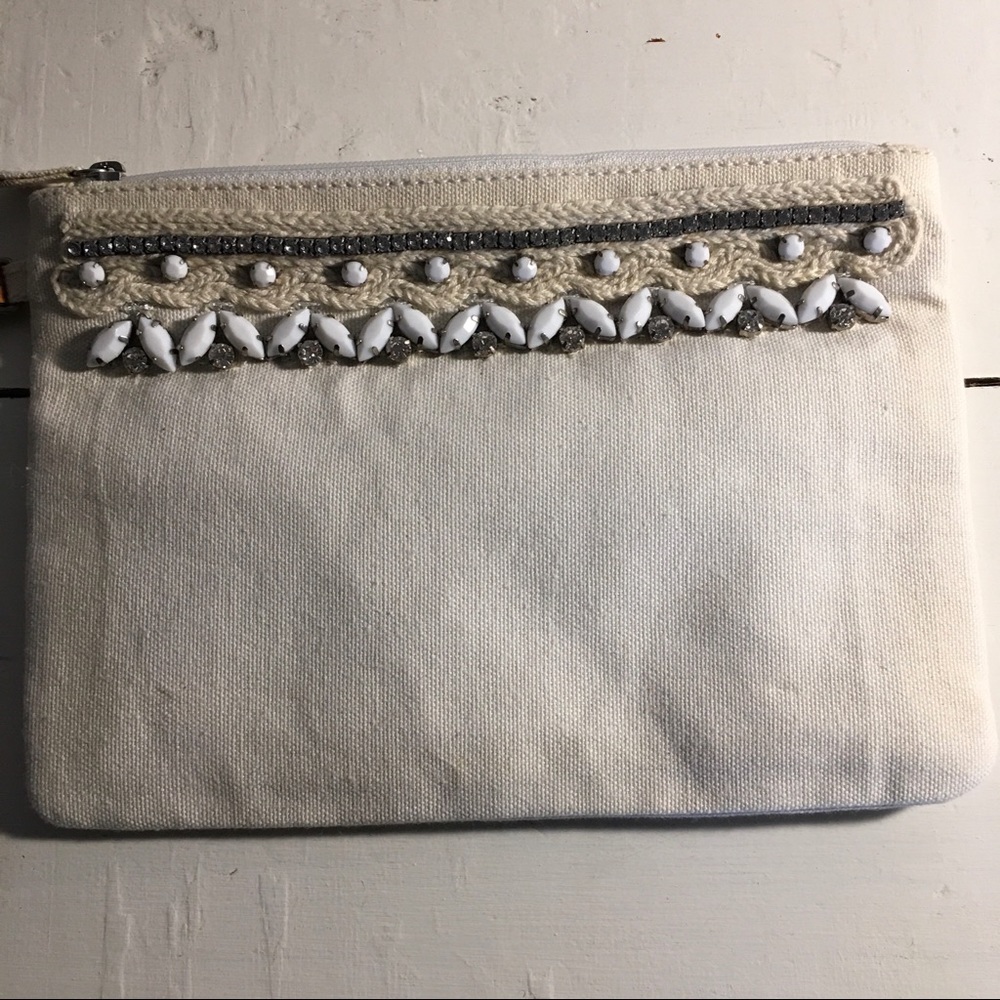 Loft off-white wristlet, never used